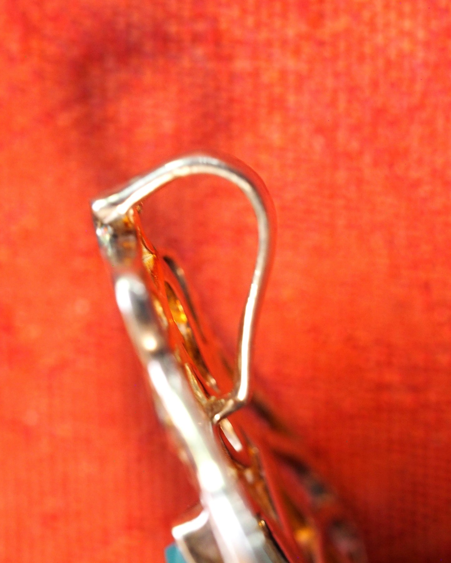 Close-up of slide bail hardware on Derewala sterling silver pendant