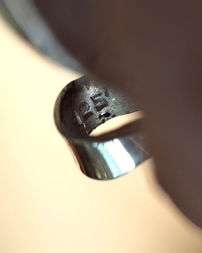 Close-up of 925 stamp on interior of sterling silver bail