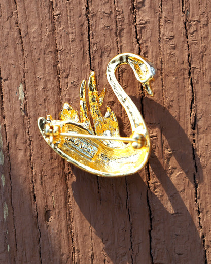 Back view of Marvella swan brooch showing pin back and signature stamp