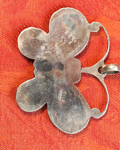 Back of butterfly pendant with solid sterling silver construction, surface wear and 925 stamp