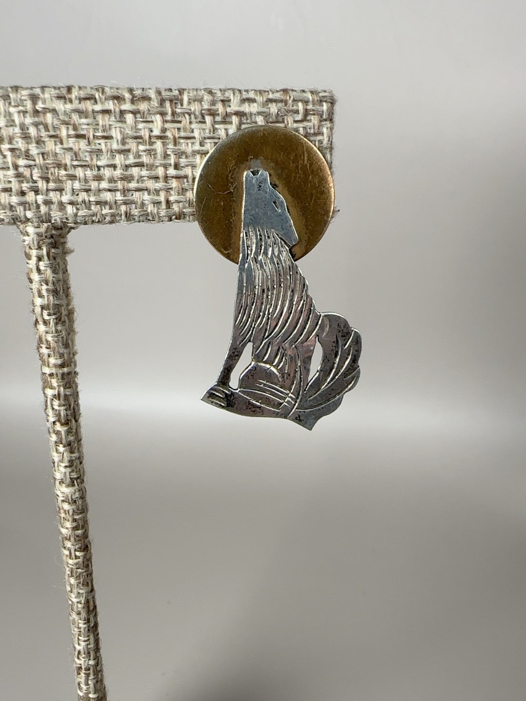 Vintage sterling silver and brass coyote moon earring front detail
