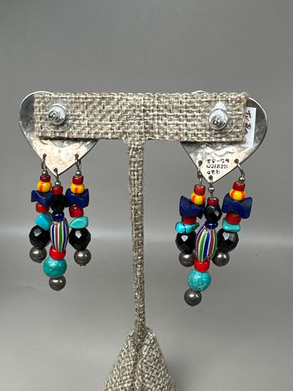 Back view of sterling silver Taxco heart pierced earrings showing TS-59 MEXICO 925 hallmarks