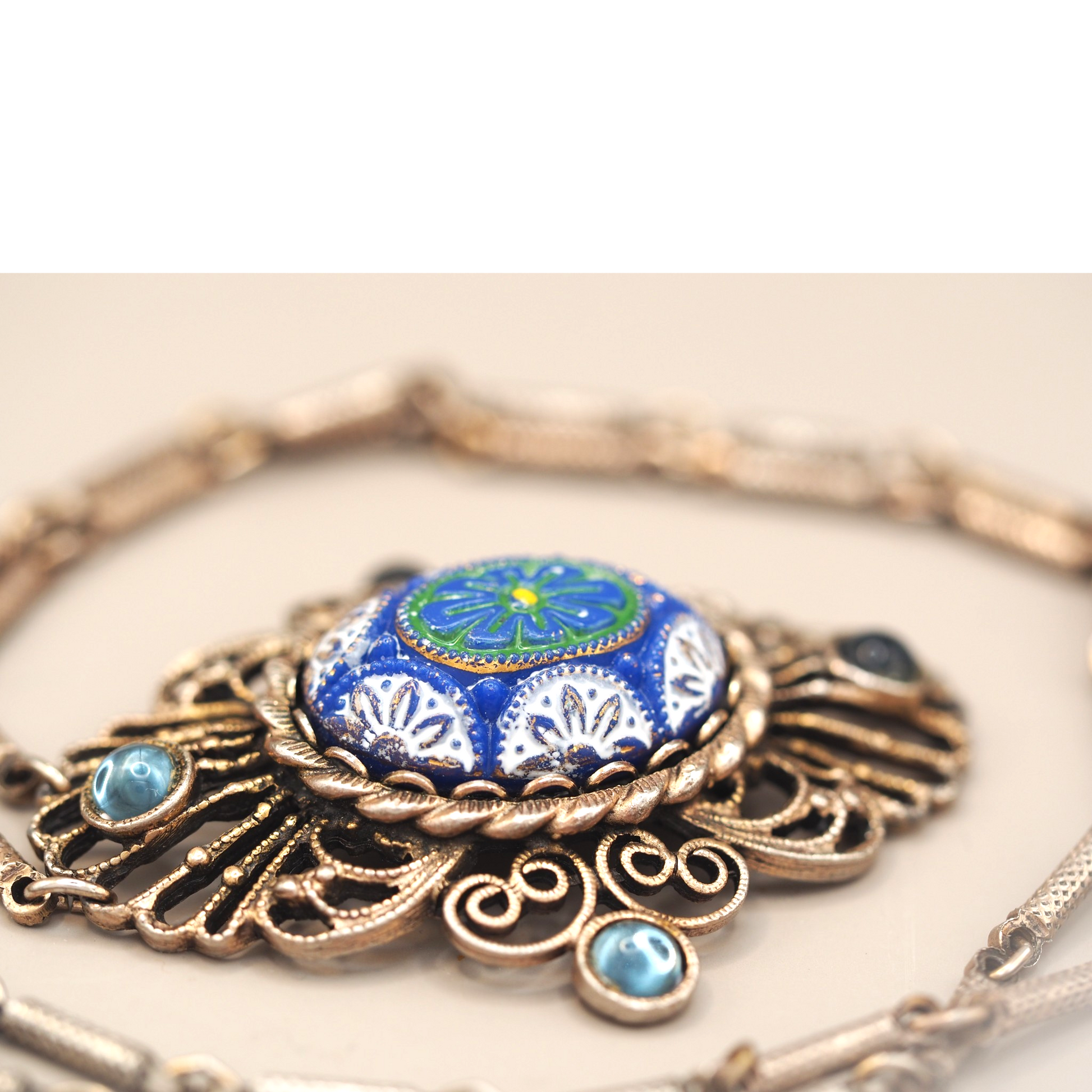 Textured geometric link chain on vintage blue filigree necklace