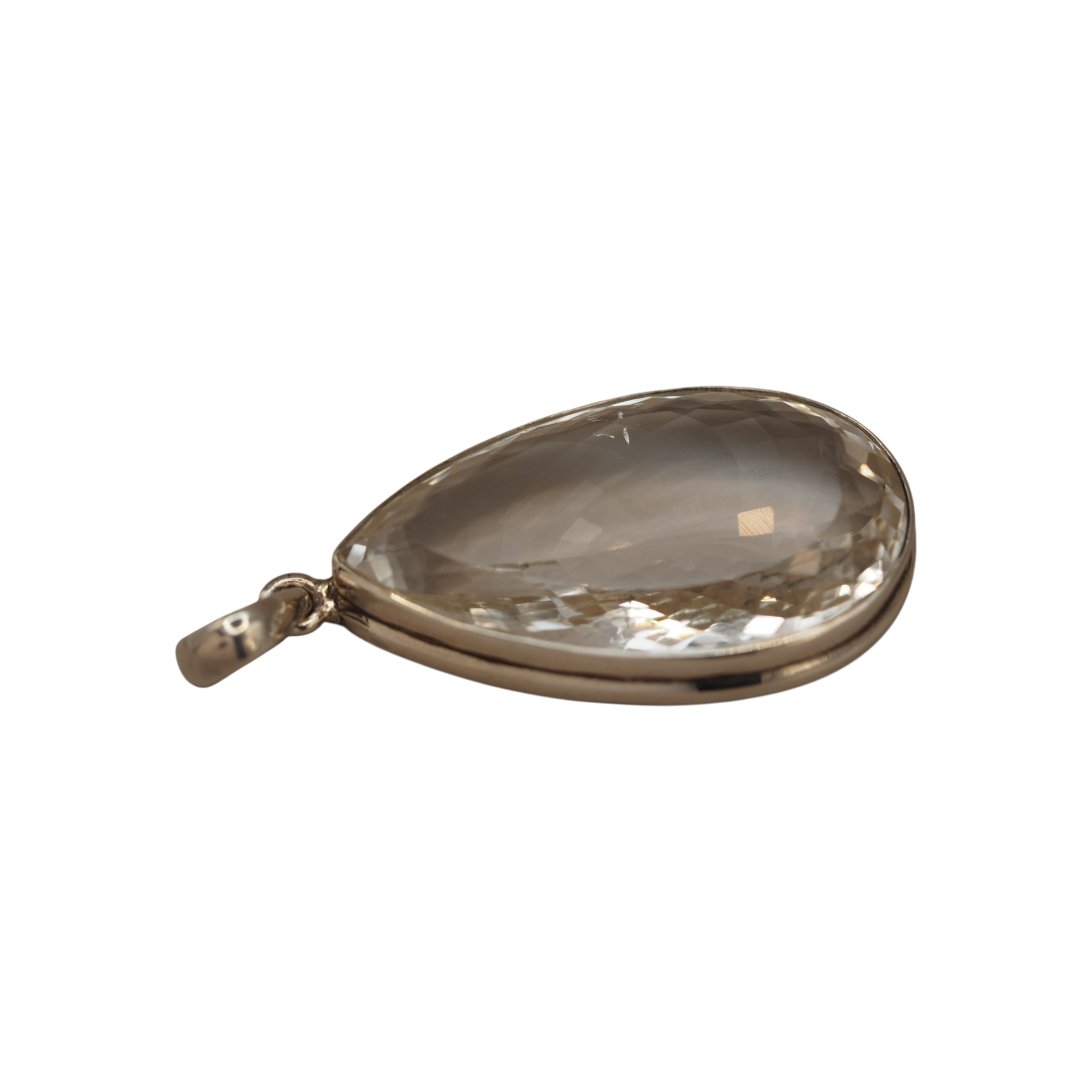 Side profile of bezel-set clear teardrop pendant