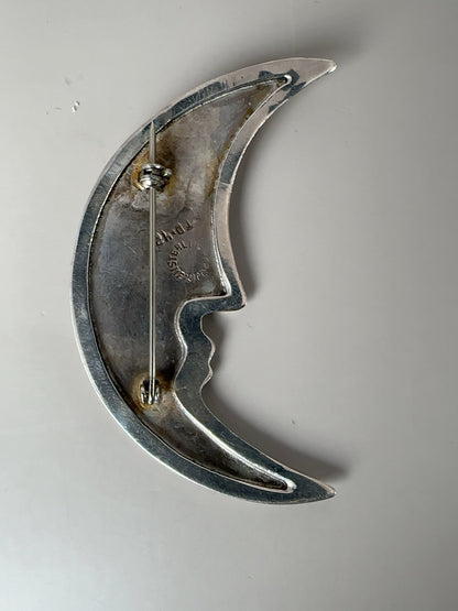 Vintage Taxco sterling moon face and star brooch pendant pair shown together