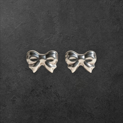 Charming Bow Sterling Silver Stud Earrings Earrings - GlamGram NYC