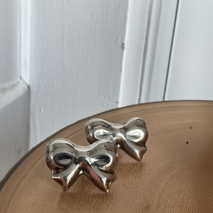 Charming Bow Sterling Silver Stud Earrings Earrings - GlamGram NYC