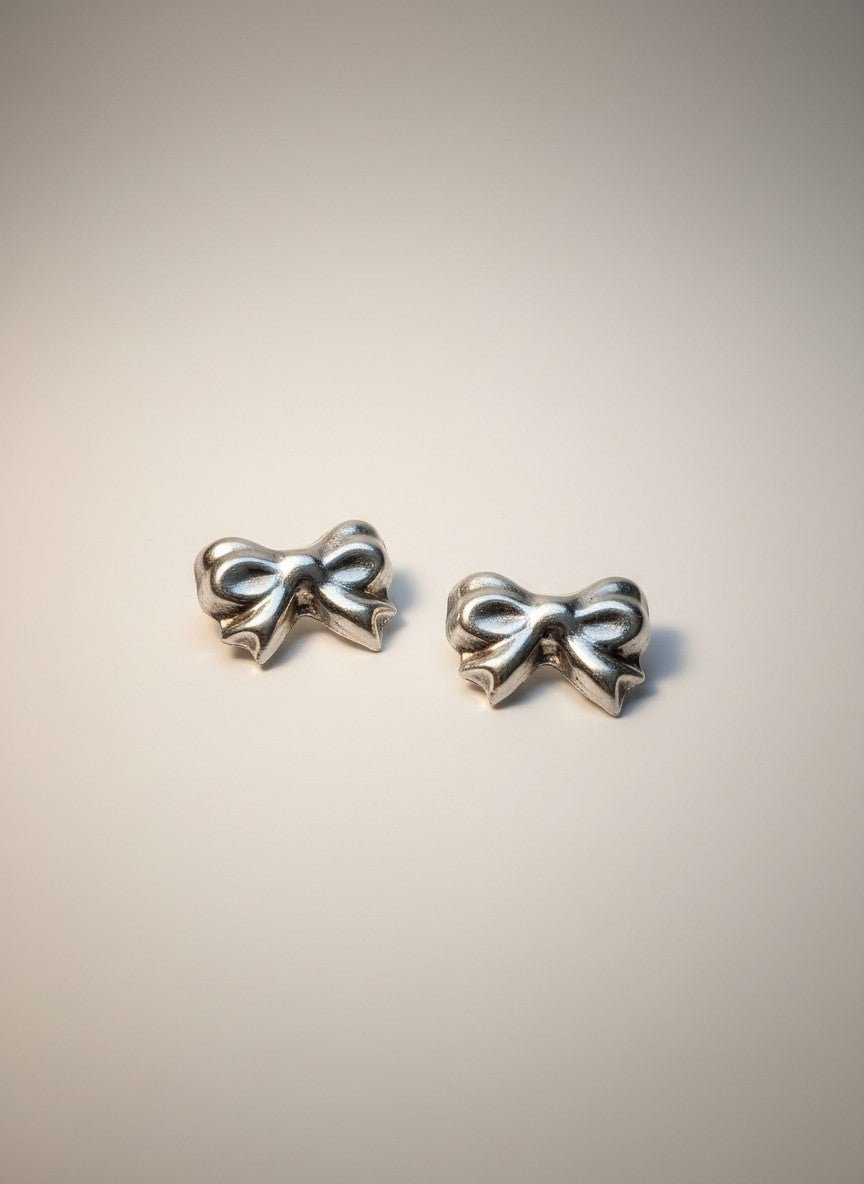 Charming Bow Sterling Silver Stud Earrings Earrings - GlamGram NYC