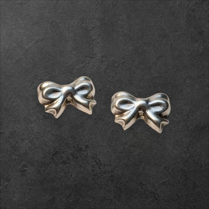 Charming Bow Sterling Silver Stud Earrings Earrings - GlamGram NYC