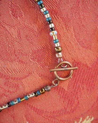 Handmade mixed glass bead necklace clasp detail