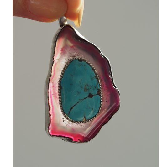 Turquoise and pink agate pendant in natural light