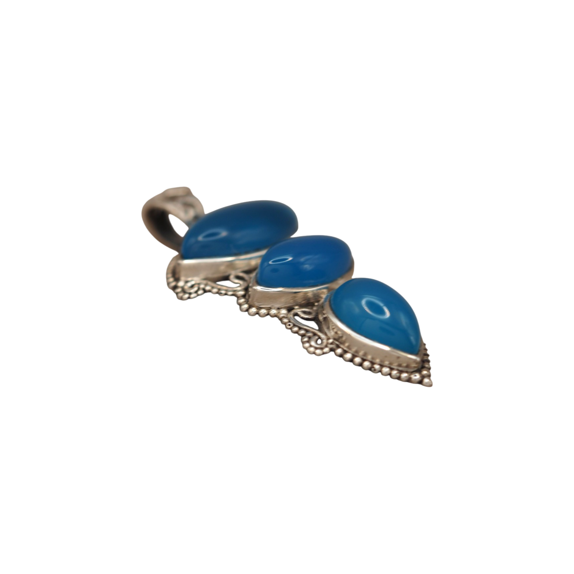 Side view of graduated blue chalcedony cabochons in sterling silver