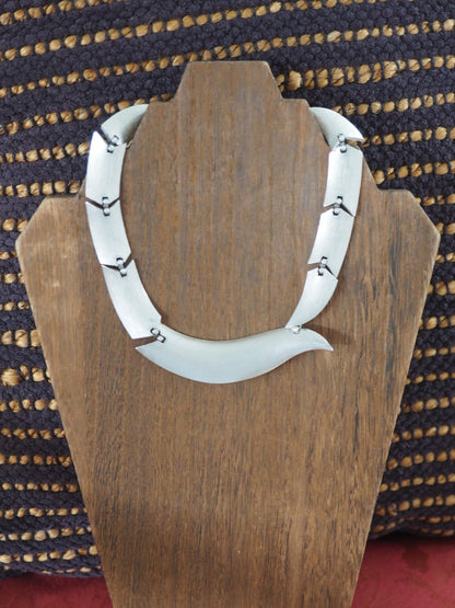 Trifari silver-tone collar necklace curved links and hinged connectors detail