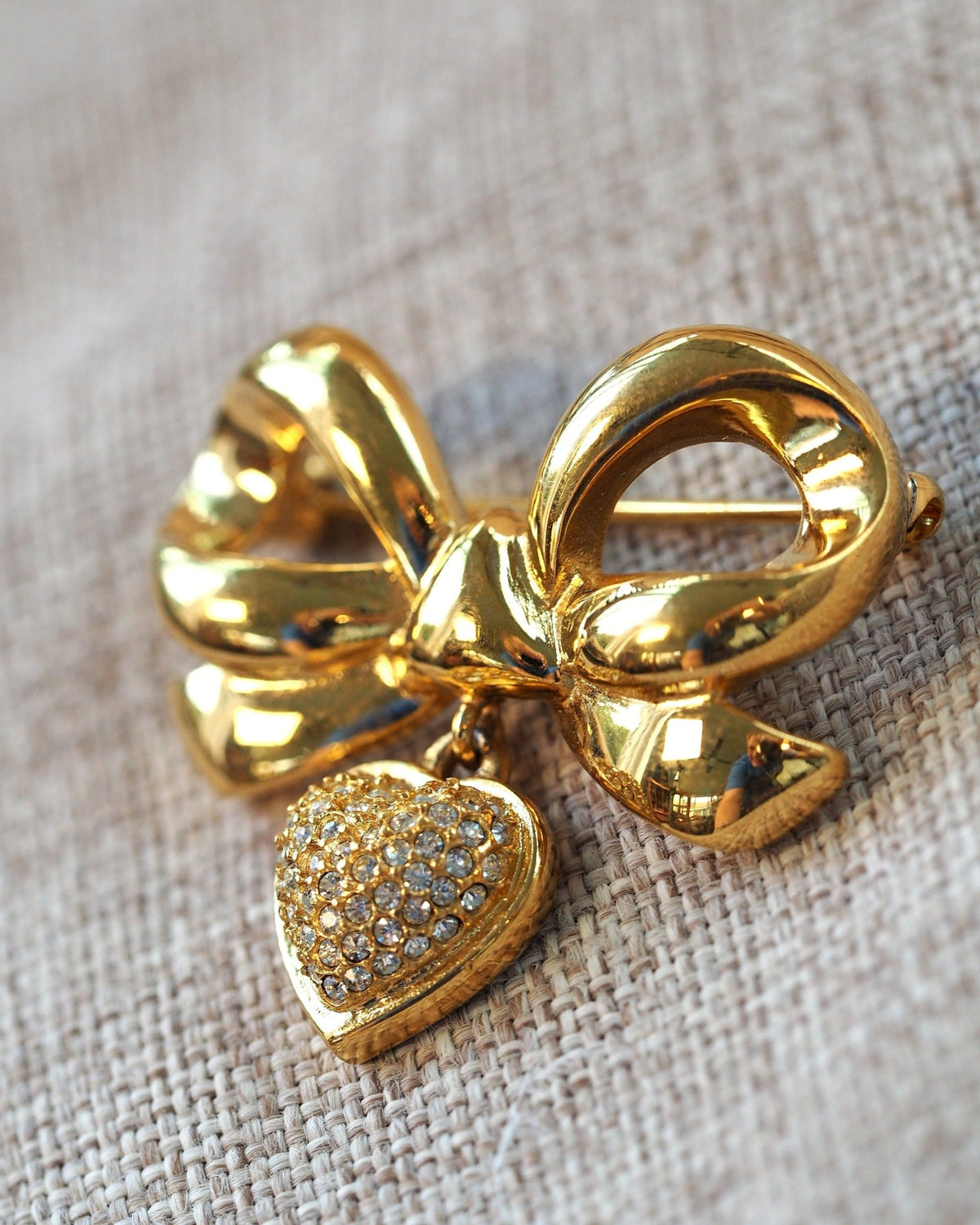 Vintage Elizabeth Taylor White Diamonds Brooch, Rhinestone Bow with Heart Charm, Signed 1990s Designer Pin, Coquette Gift Brooch - GlamGram NYC
