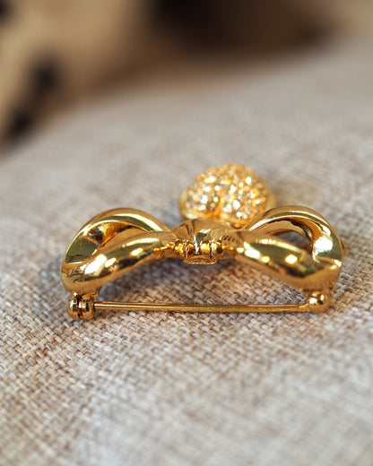Vintage Elizabeth Taylor White Diamonds Brooch, Rhinestone Bow with Heart Charm, Signed 1990s Designer Pin, Coquette Gift Brooch - GlamGram NYC