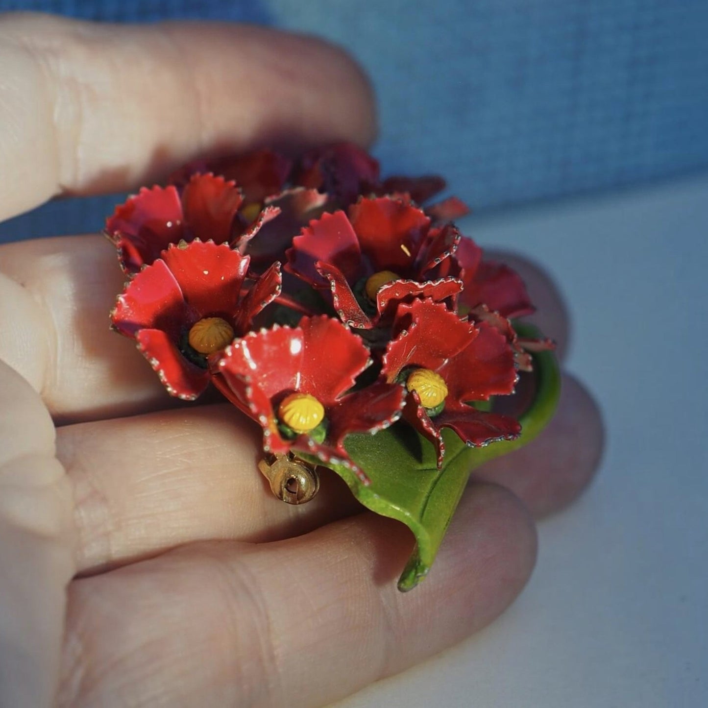 Vintage Red Painted Metal Flower Brooch on Green Leaf Base Brooch - GlamGram NYC