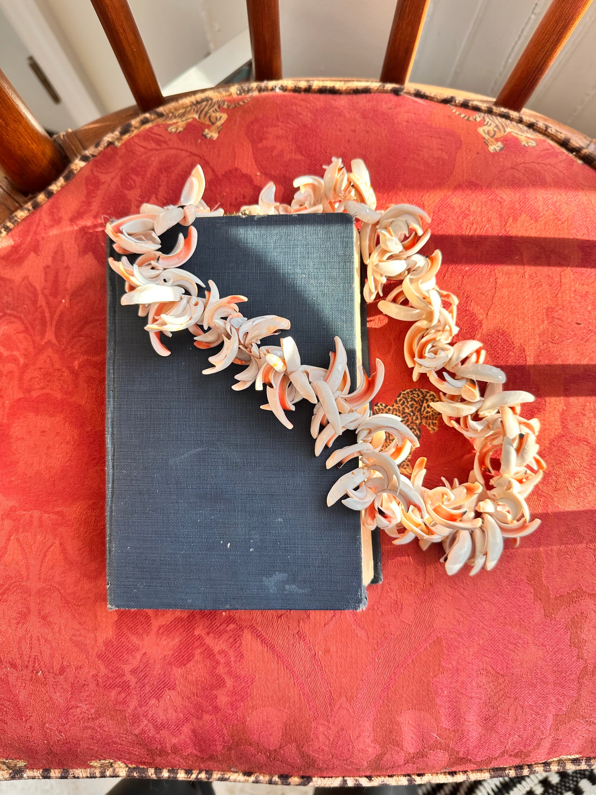 Vintage natural shell necklace in carved cream and peach shell, screw clasp closure